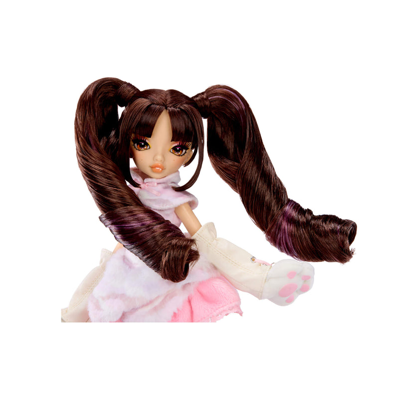 Doll with long brown hair in pigtails on a white background