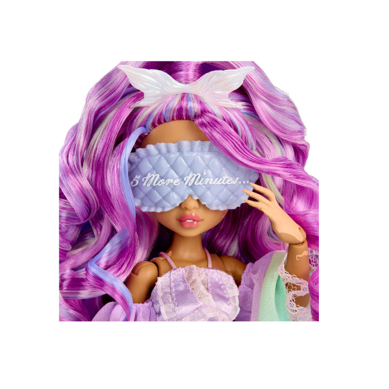 Doll wearing a sleep mask with text  "Five more minutes" on a white background