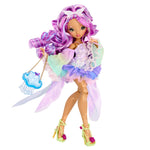 Fashion doll dressed in a colorful dress with green shoes on a white background