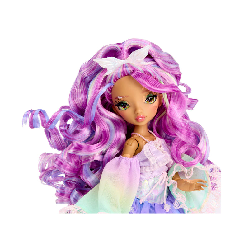 Doll with pink hair and purple highlights on a white background 