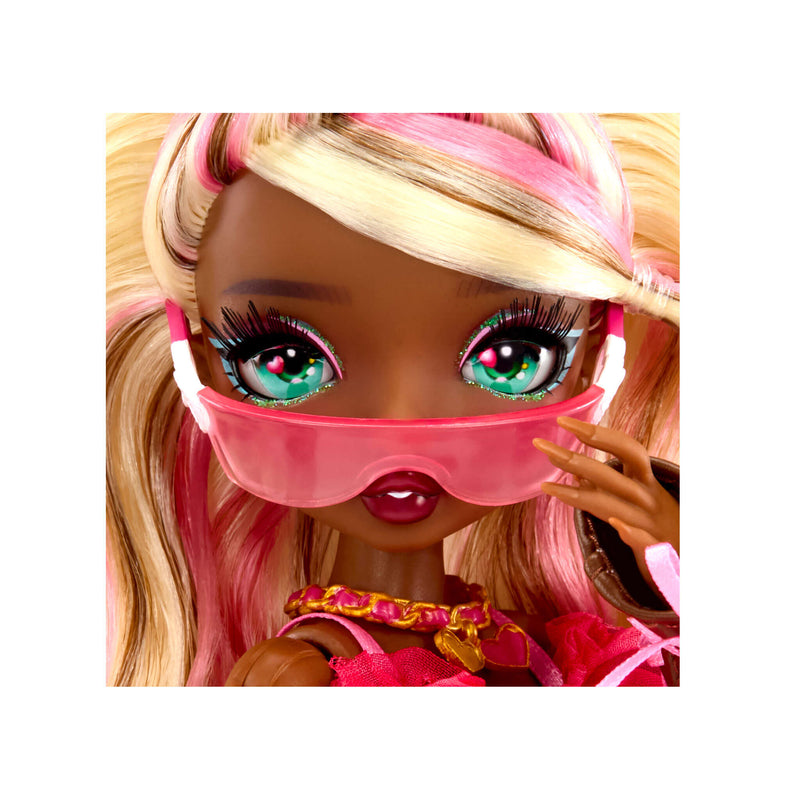A close-up of a doll with blonde and pink hair, bright green eyes, wearing  translucent pink sunglasses and a pink necklace with gold accents.