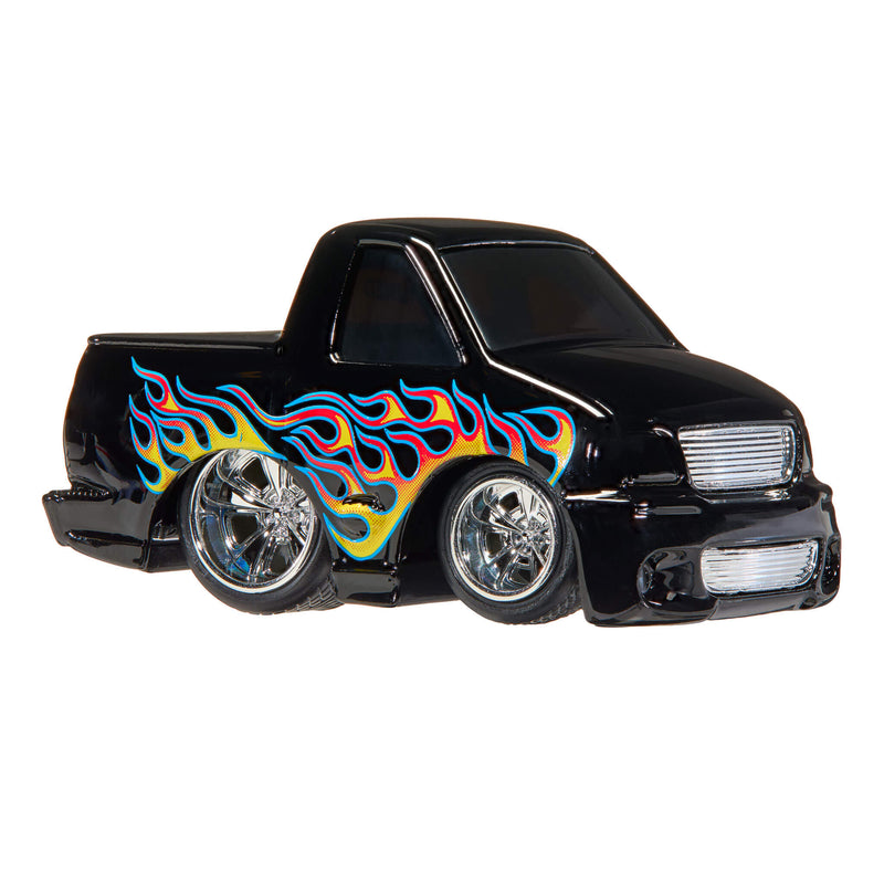A black toy diecast pickup truck with colorful flame decals in blue, red, orange, and yellow along the side, shown on a plain white background.