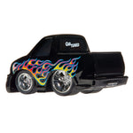 A black die-cast toy pickup truck with colorful flame decals on the side, chrome wheels, and 'CAR TUNED' text on the rear window, shown against a plain white background.