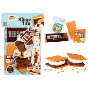 Hershey's Slime Life S'mores kit displayed with its packaging on the left and individual components on the right, including a Hershey's chocolate bar, a bag of marshmallows, a box of graham crackers, and assembled slime s'mores.
