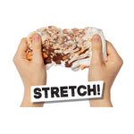 Two hands stretching a large, messy marshmallow treat with chocolate swirls, with a white sticker overlay reading 'STRETCH!'.