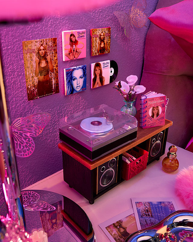 Decorative room setup with MGA's Miniverse Real Music Britney Spears Special Edition and pink lighting.