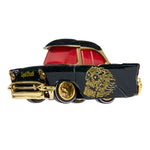 A black classic toy car with gold trim, a red windows, and gold skull graphics on the side, shown against a plain white background.