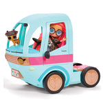 Doll driving with a small puppy doll sitting on the dash on a white background.