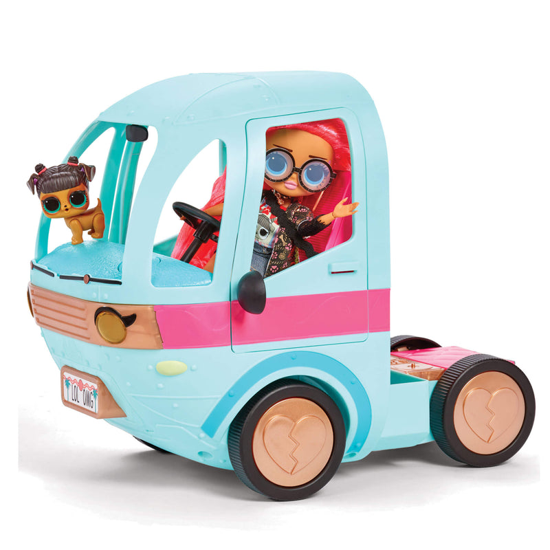 Doll driving with a small puppy doll sitting on the dash on a white background.