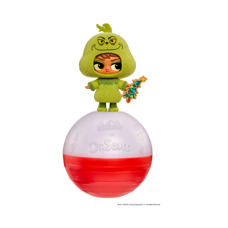 Red/white spherical container with a Grinch tot standing on the top