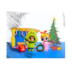 A colorful, stylized, cartoon-like holiday scene with decorated Christmas tree, a yellow fireplace, a red sack with white pom-poms, and two tot dolls on a blue floor.