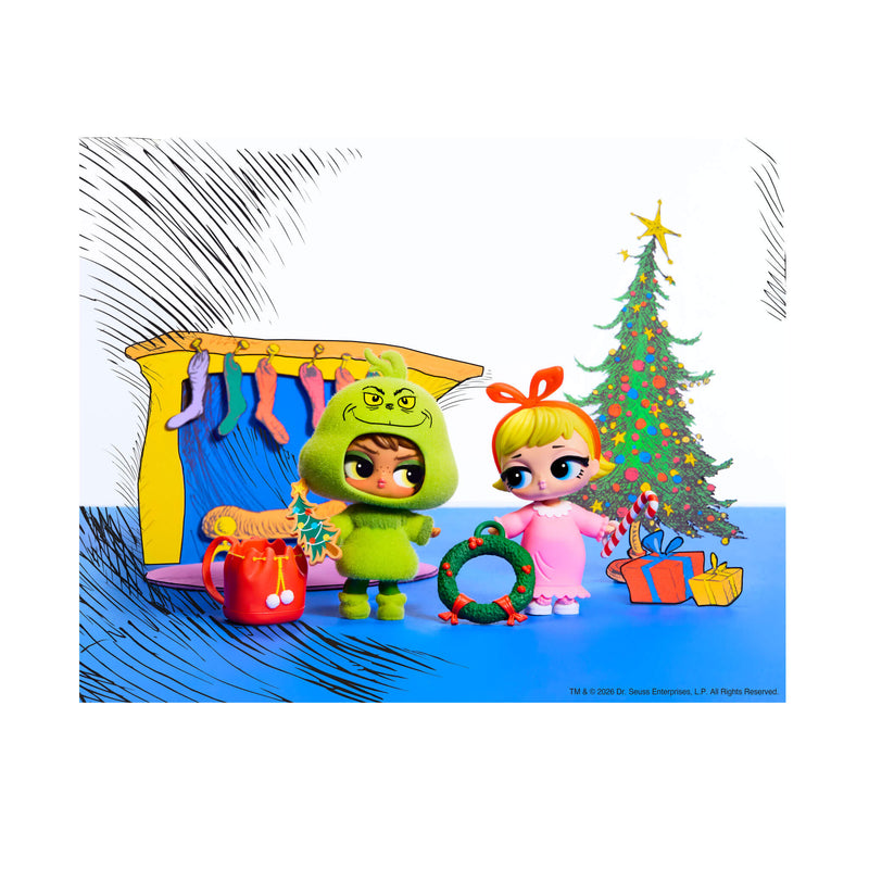 A colorful, stylized, cartoon-like holiday scene with decorated Christmas tree, a yellow fireplace, a red sack with white pom-poms, and two tot dolls on a blue floor.