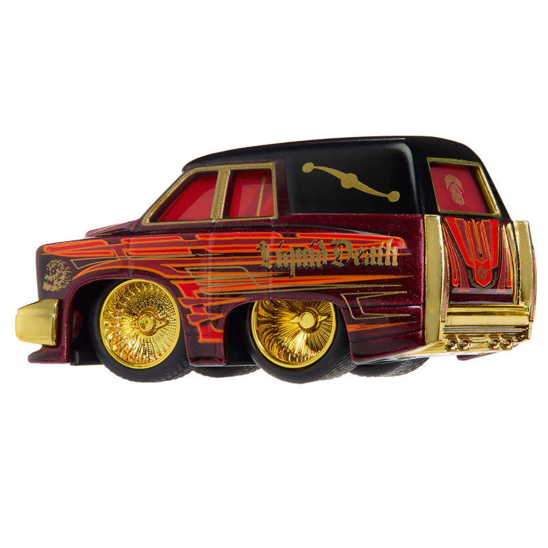 Black and red hearse with red windows, gold wheel rims and “Liquid Death” on the back panel on a white background.