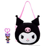 Doll keychain next to a bag with a pink skull on black head cover on a white background