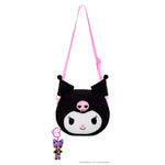 Key chain hanging from bottom of bag on a white background