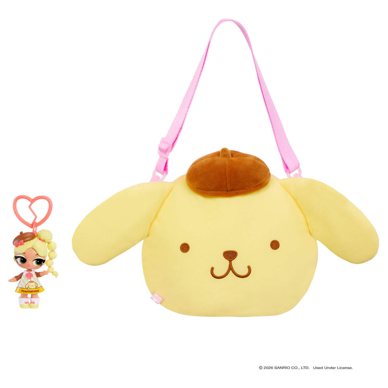 Doll keychain next to a Yellow dog bag with a brown hat on a white background