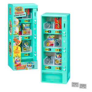Teal toy vending machine in and out of packaging with various snack packages on a white background.
