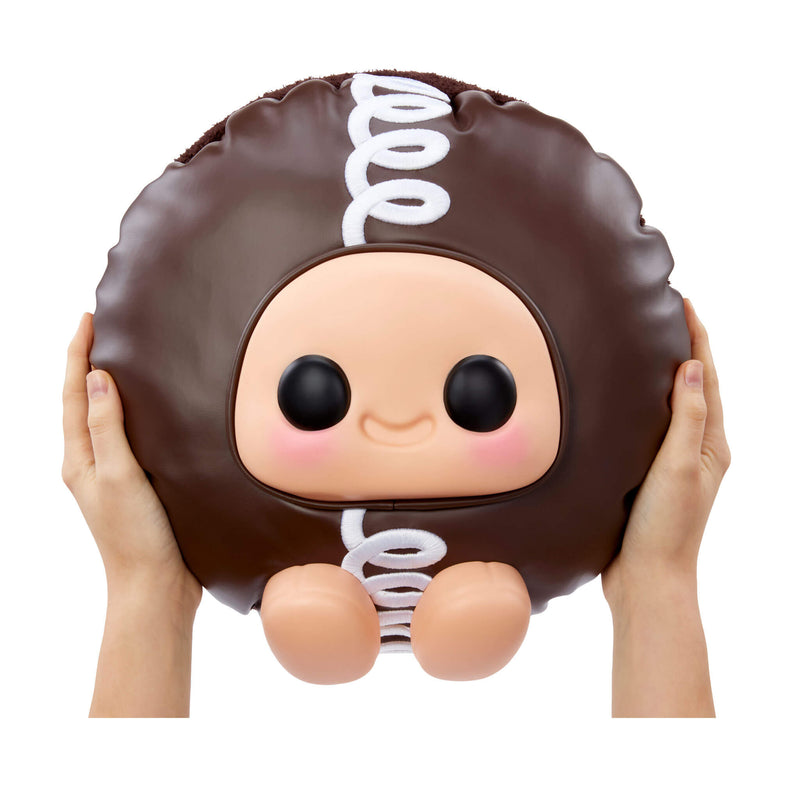 Hands holding Large Hostess Cupcake on a white background