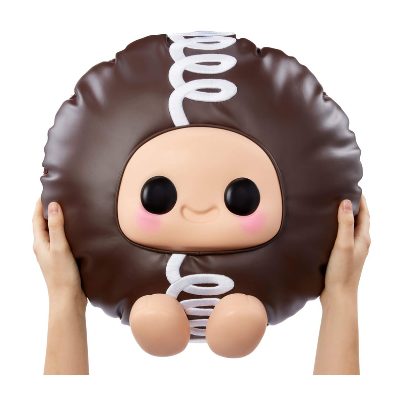 Hands holding Extra Large Hostess Cupcake on a white background