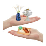 three minis in palm of hands