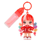 doll and lip gloss on key ring