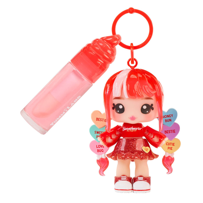 doll and lip gloss on key ring