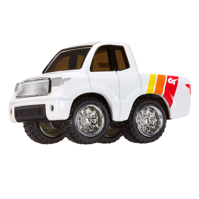 White toy truck with large wheels on a white background