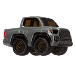 Gray toy truck with large wheels on a white background