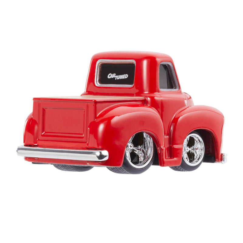 Red toy truck with chrome details on a white background