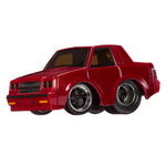 Red toy car on a white background
