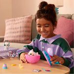 Child playing with tot on a table in a cozy living room setting