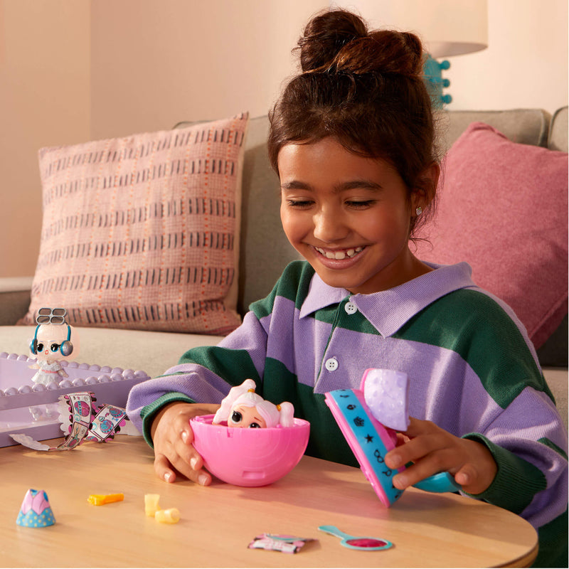 Child playing with tot on a table in a cozy living room setting