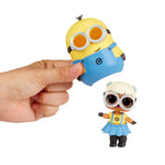 Putting costume over a tot doll