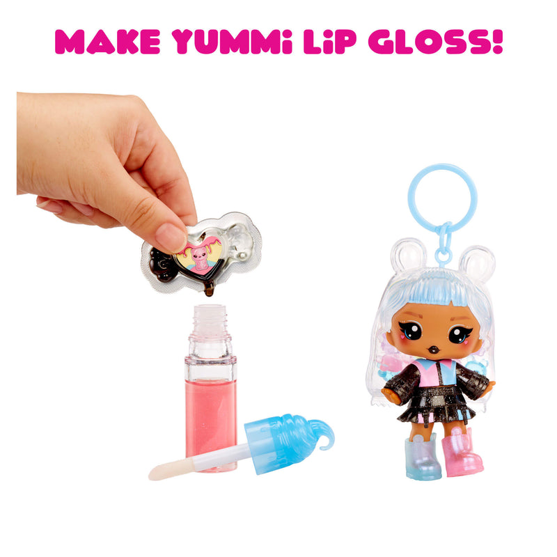 Make Yummi Lip Gloss toy set with doll and lip gloss bottle on a white background
