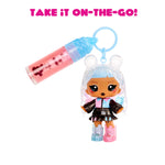 Toy keychain with a small doll and lip gloss on a white background with text 'Take it on-the-go!