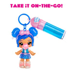Toy figure with blue hair and a bubble gum dispenser, keychain attached, on a white background with 'Take it on-the-go!' text.