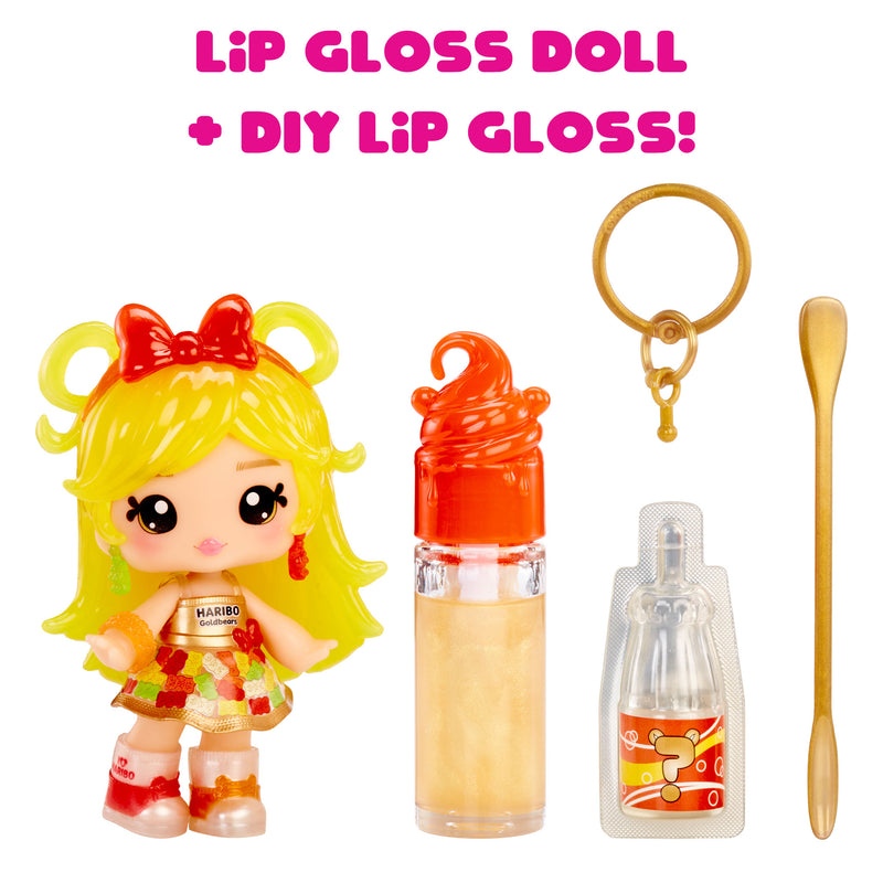 Lip gloss doll and DIY lip gloss kit with a spoon on a white background