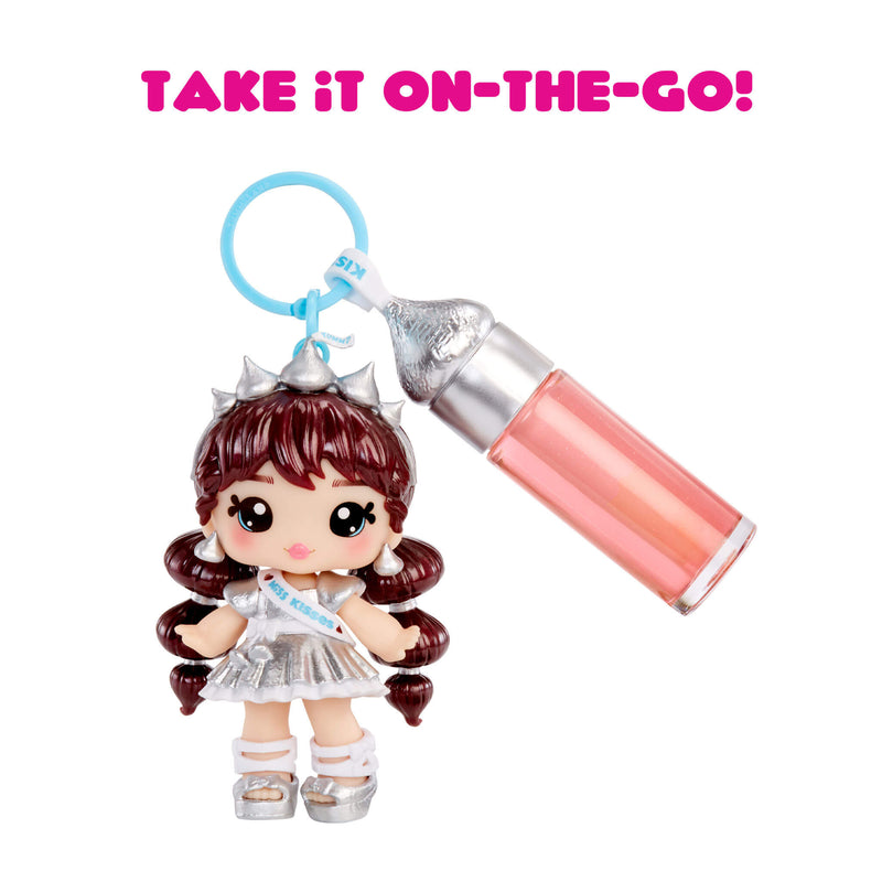 Keychain with a character holding a spray bottle labeled 'Take it on-the-go!'