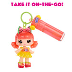 Toy figure with watermelon-themed hair and a Jolly Rancher candy container, with 'Take it on-the-go!' text above.