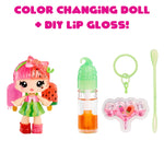 Color changing doll with lip gloss and accessories on a white background
