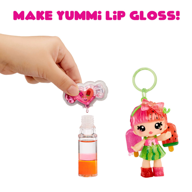 Make Yummi lip gloss kit with a small doll and lip gloss bottle on a white background