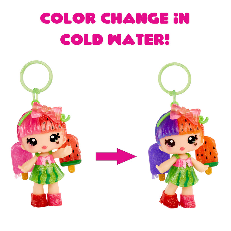 Toy figure with color-changing feature in cold water, showing pink hair turning purple.