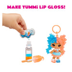 Make Yummi Lip Gloss set with a small doll and lip gloss components on a white background.