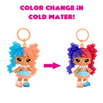 Toy character with color-changing hair on a white background