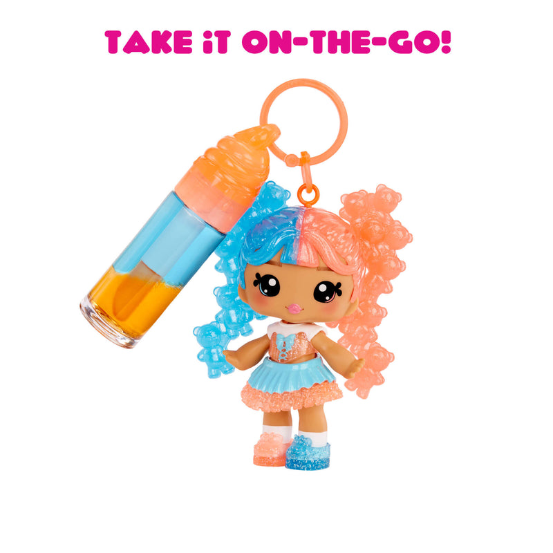 Small figurine with colorful hair and a bottle, keychain attached, on a white background with text 'Take it on-the-go!'.