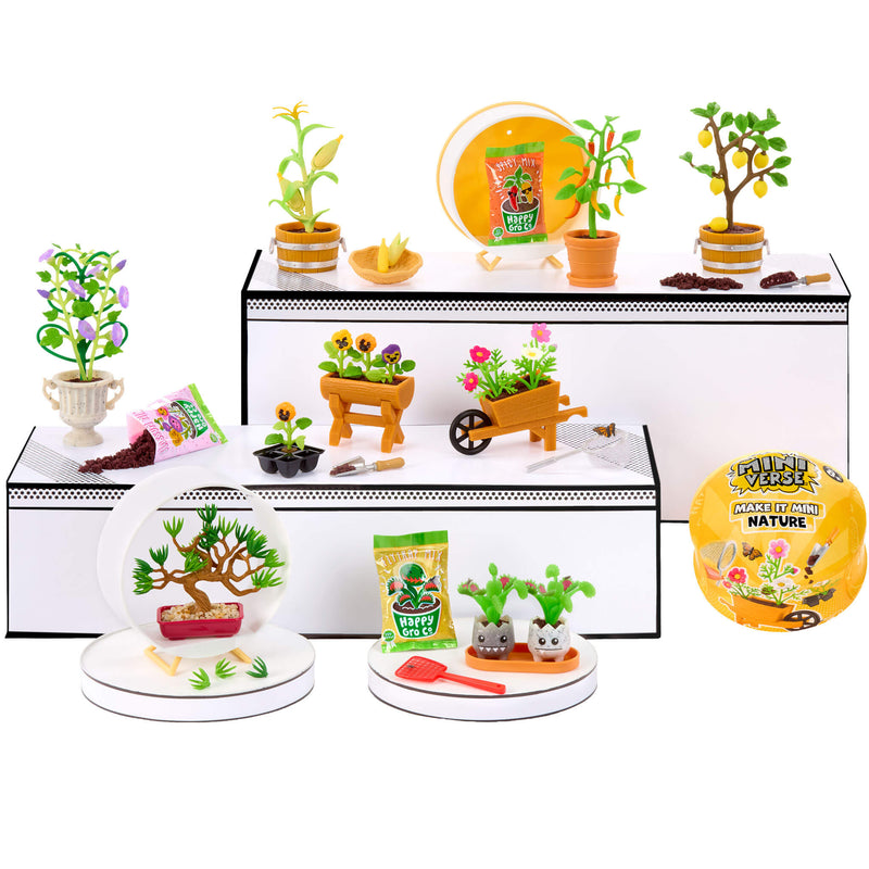 Set of miniature gardening items including plants, pots, and tools on a white background