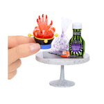 Miniature shrimp with mini hand in middle of bowl