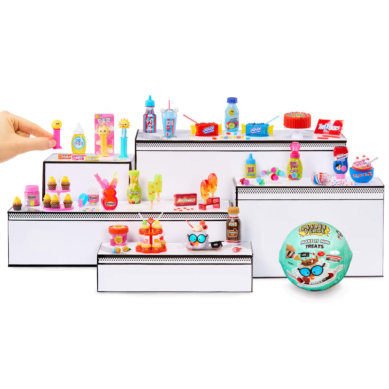 Miniature toy store display with all twelve Make it Mini Treats on a white background
