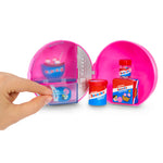 Pink ball display with small Bazooka and a hand interacting with it on a white background