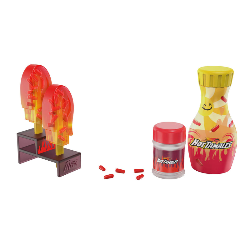 Mini Hot Tamales candy set with stand, bottles, and red candy pieces on a white background
